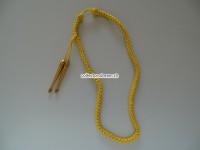 Fangschnur, Musik, Schweiz. Farbe gold-gelb, mit 2 Metallstiften