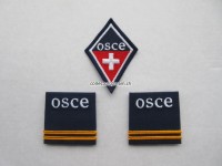 Offiziers Schlaufen und ein Kragenspiegel, Oberleutnant " OSCE "