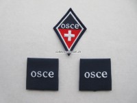 Soldaten Schlaufen und ein Kragenspiegel " OSCE "