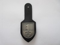 Metallabzeichen, Kapo Obwalden, auf Leder montiert