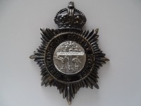 Bobbyhelm Metallabzeichen, British " Huntingdon County Police "
