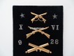 Mustertafel mit Metallabzeicheichen, div. Ordonnanzen