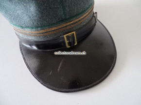 Infanterie Oberleutnant Schirmmütze Ord. 1914 mit grünem Passepolis