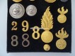 Mustertafel mit Uniform Knöpfen, Zahlen und Emblemen