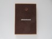 Wandplakette Kapo Bern, Metallabzeichen (ehemaliges Mützenabzeichen) auf Holz